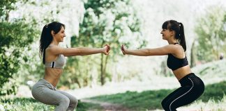 Two fit women warming up-cooling down