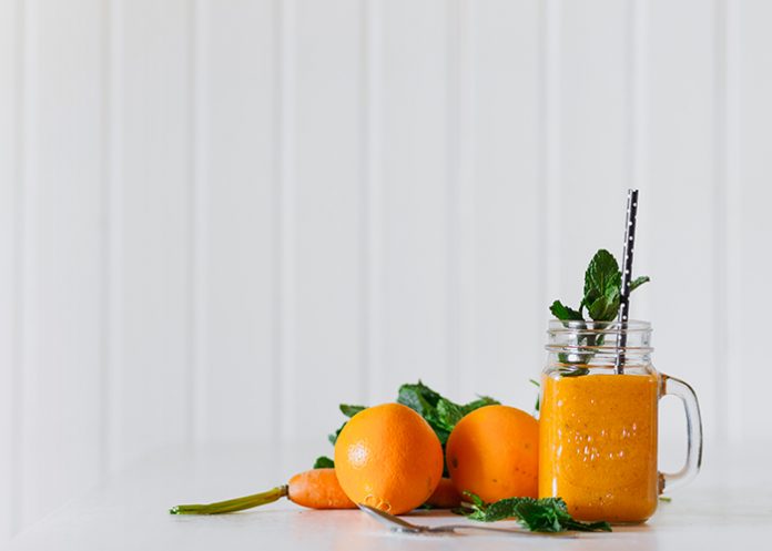 A fresh orange and carrot juice