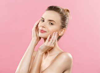 10 Easy and Natural Ways to Get Rid of Acne Happy woman with glowy skin