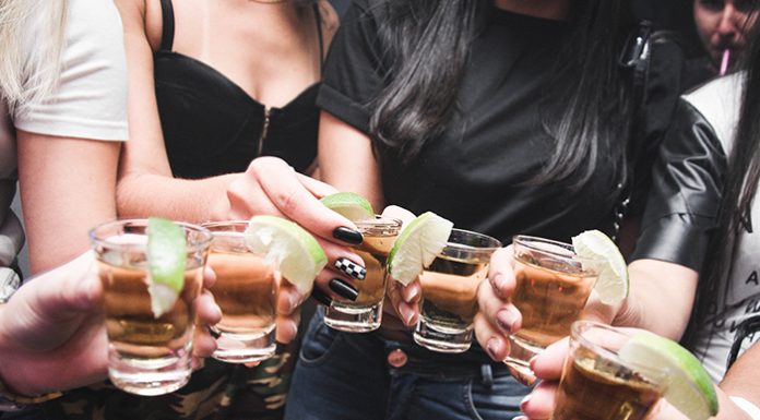 Young girls drinking alcohol