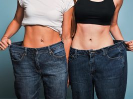 Two fit women in loose jeans