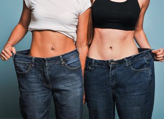 Two fit women in loose jeans