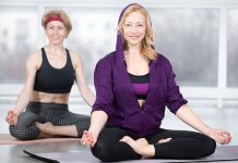 Middle aged sportswomen doing pilates